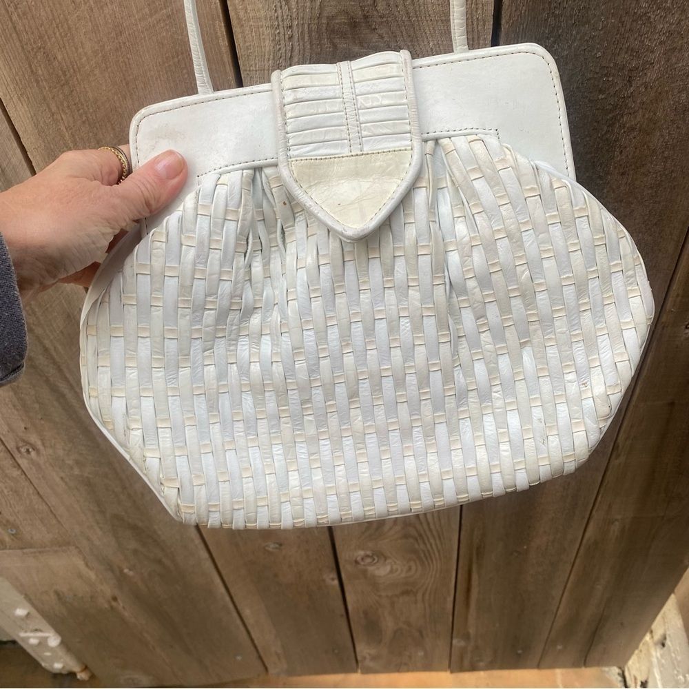 white  vintage woven leather clutch bag